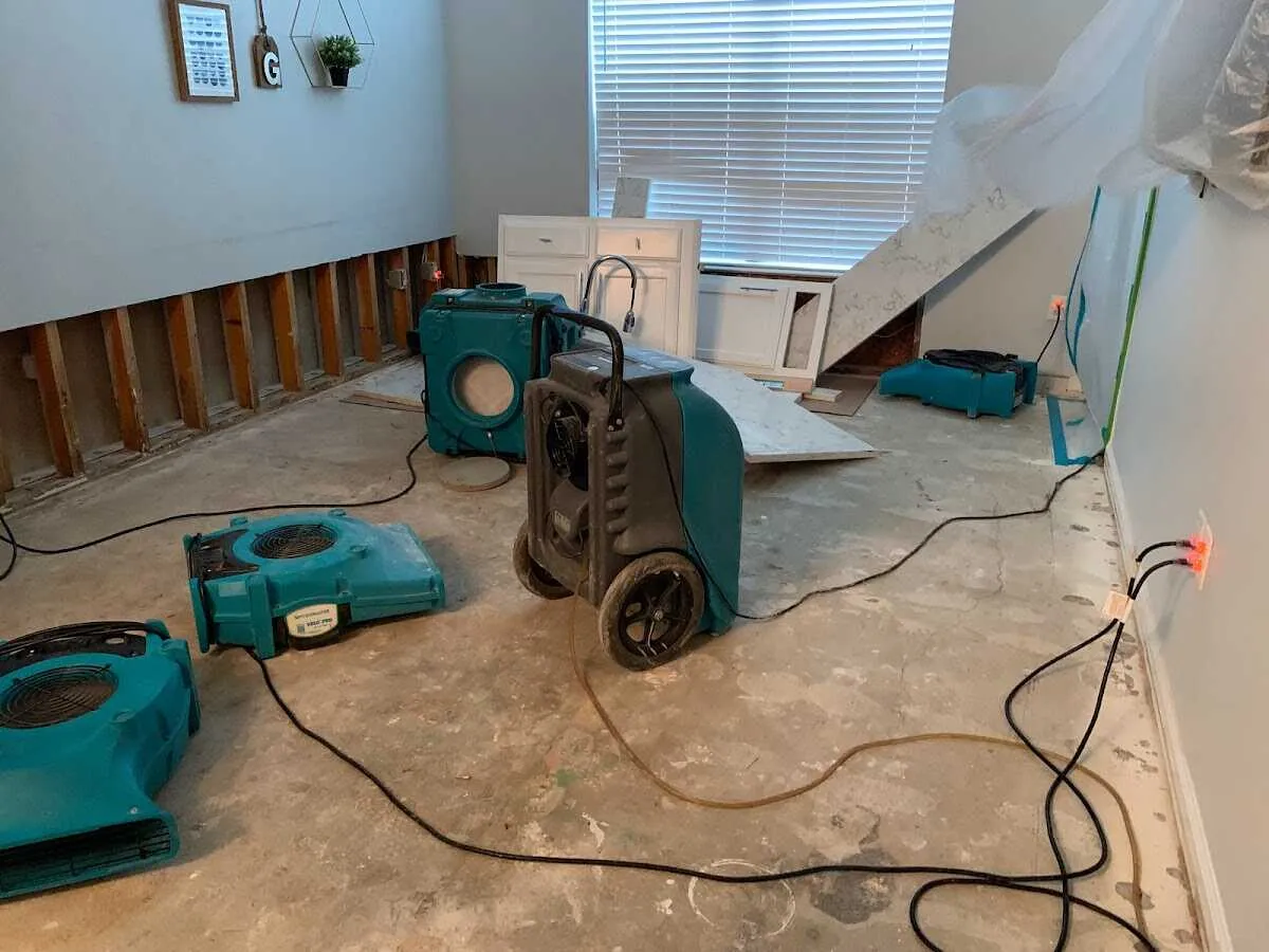 Dehumidifier in flood-cut room for Water Damage Restoration in East Haven